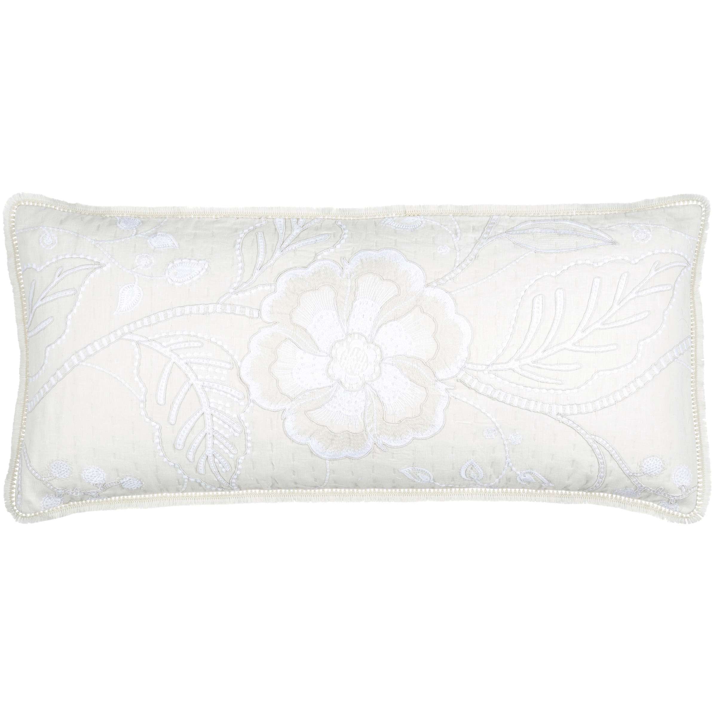 white embroidered throw pillow