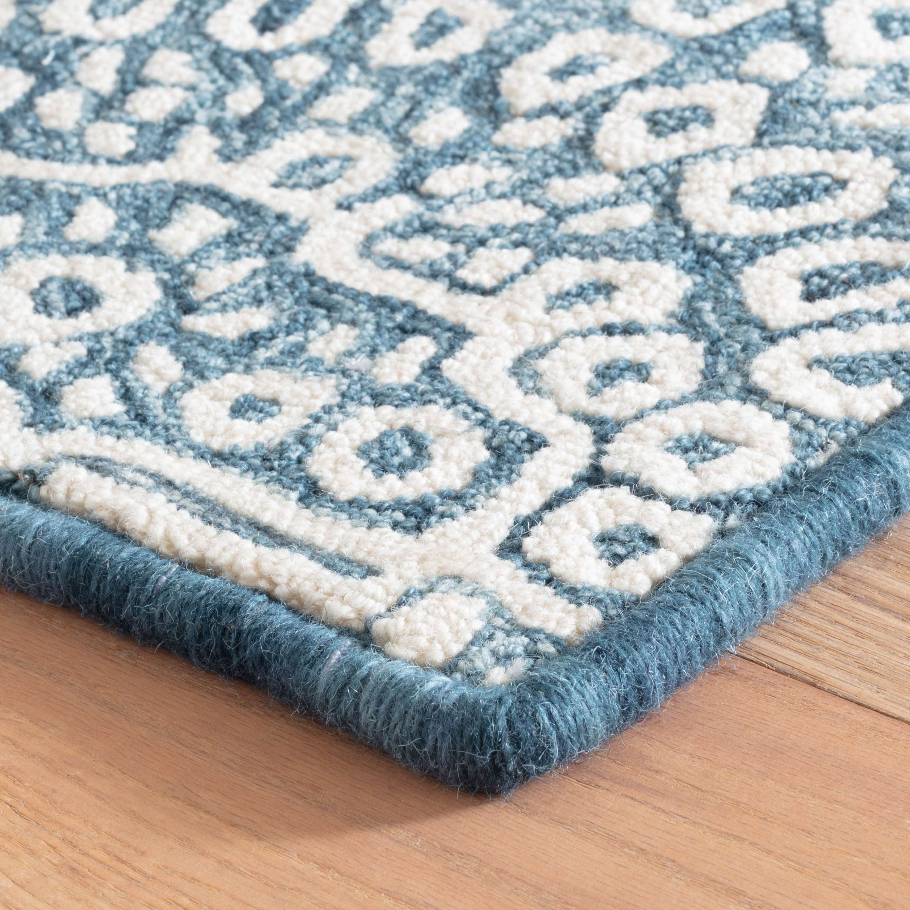 https://annieselke.scene7.com/is/image/FreshAmerican/TempleInkHandMicroHookedWoolCustomRug_DA2081_beauty_95?$PCH%20Product$